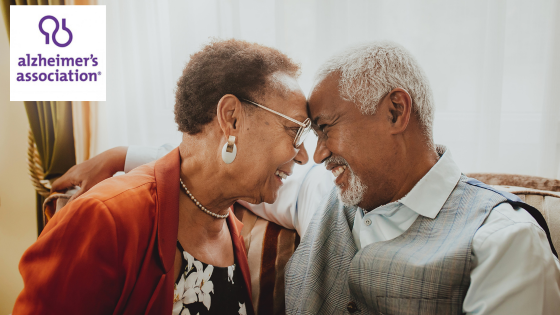 The Alzheimer's Association and older couple talking 